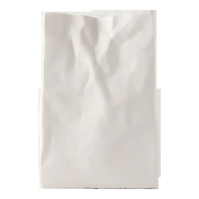 Elegant white ceramic flower vase with a smooth finish, perfect for home decor