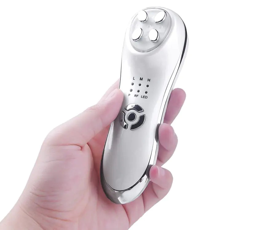 Gizmo Gadgets LED Photon Beauty Device held in hand for facial skin treatment