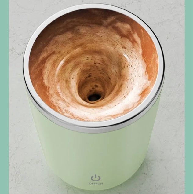 Gizmo Gadgets Magnetic Coffee Mug with a swirling coffee design inside for optimal beverage enjoyment