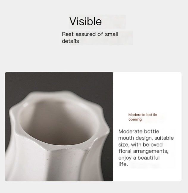 Minimalist white vase decor with a unique shape, perfect for showcasing floral arrangements