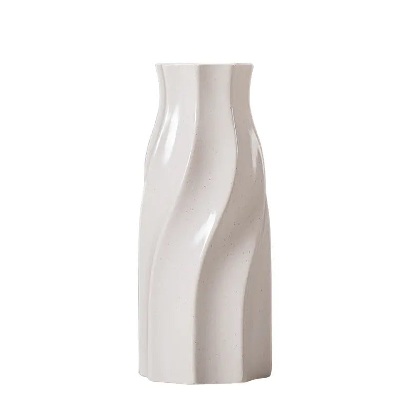 Stylish minimalist white vase decor with a unique wave design for modern home interiors