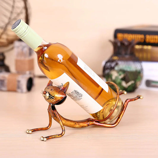 Modern metal yoga cat wine rack featuring a playful cat design holding a wine bottle