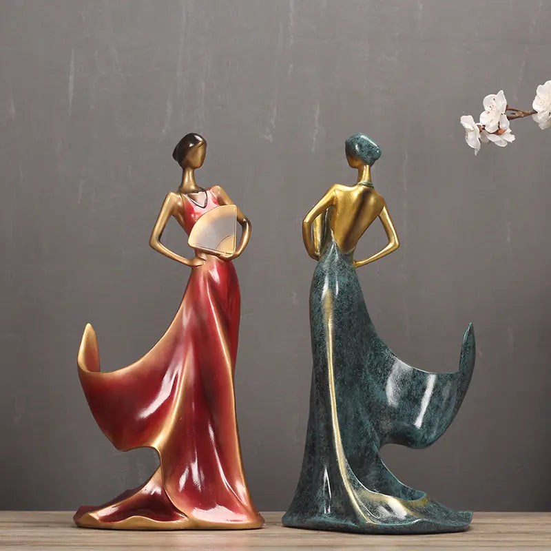 Elegant modern wine rack with figurine design featuring stylish female sculptures in vibrant colors