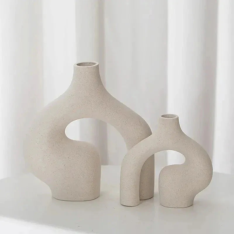 Nordic ceramic vase decor in minimalist shapes, perfect for enhancing modern interior designs