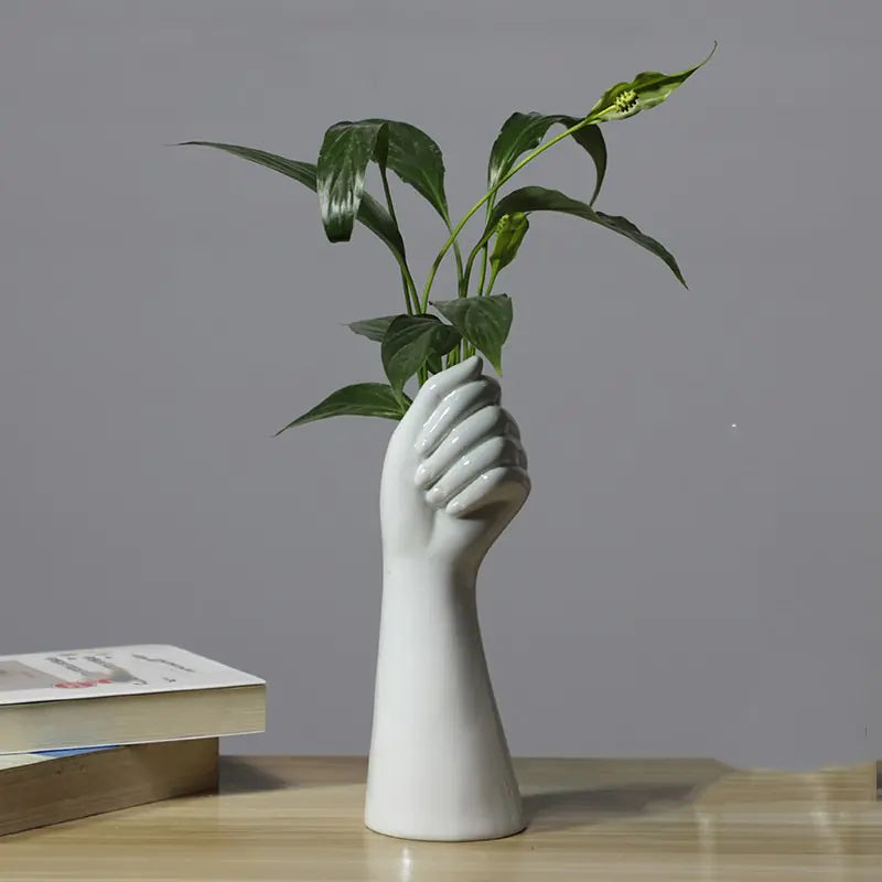Unique Nordic vase with dried flowers depicting a hand design, perfect for modern decor