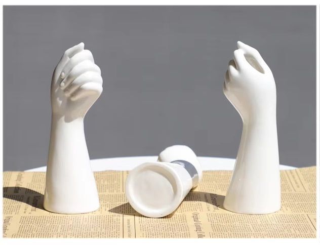 Nordic vase with dried flowers showcasing a modern design featuring elegant hand-shaped forms