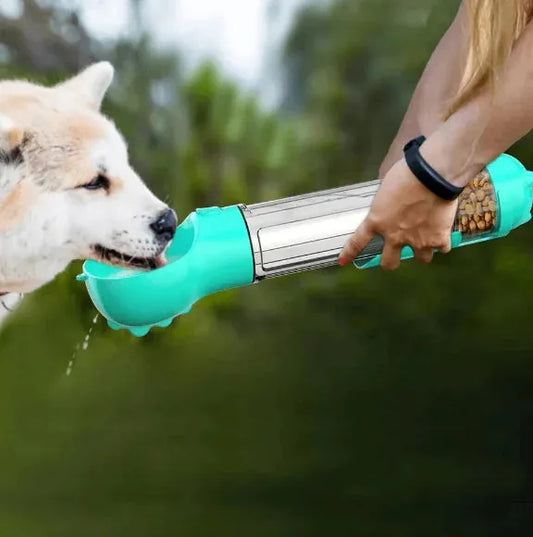Gizmo Gadgets portable dog water bottle in use, providing water to a thirsty dog outdoors