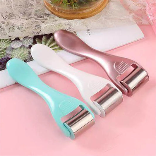 Set of three stainless steel ice rollers in pastel colors for soothing facial massage