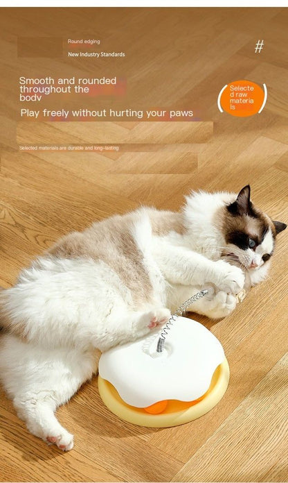 Leaky ball cat toy with soft edges for safe play, featuring a playful cat engaging with the toy