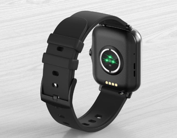 Back view of a sleek black smart watch with encoder showcasing a green light indicator